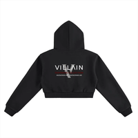 Black cropped hoodie with 'Villain Dominion Collection' text and gray graphic on back