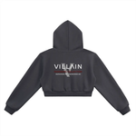 Black cropped hoodie with VILLAIN Dominion Collection text on back, streetwear style