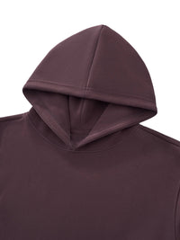 Cropped view of a dark brown heavyweight hooded sweatshirt on white background