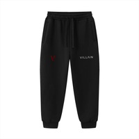 Black drawstring jogger sweatpants with VILLAIN text and red V logo, streetwear style