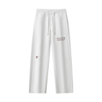 White straight-leg sweatpants with drawstring, 'VILLAIN' and 'V' logos on front
