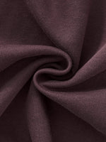 Close-up of heavyweight brown sweatpants fabric with soft texture and knit weave detail