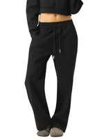 Black straight leg drawstring sweatpants, relaxed fit, modeled on white background