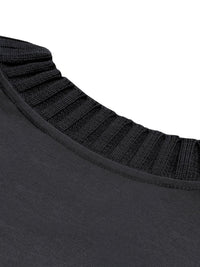 Close-up of heavyweight black knitted crew neck t-shirt collar texture