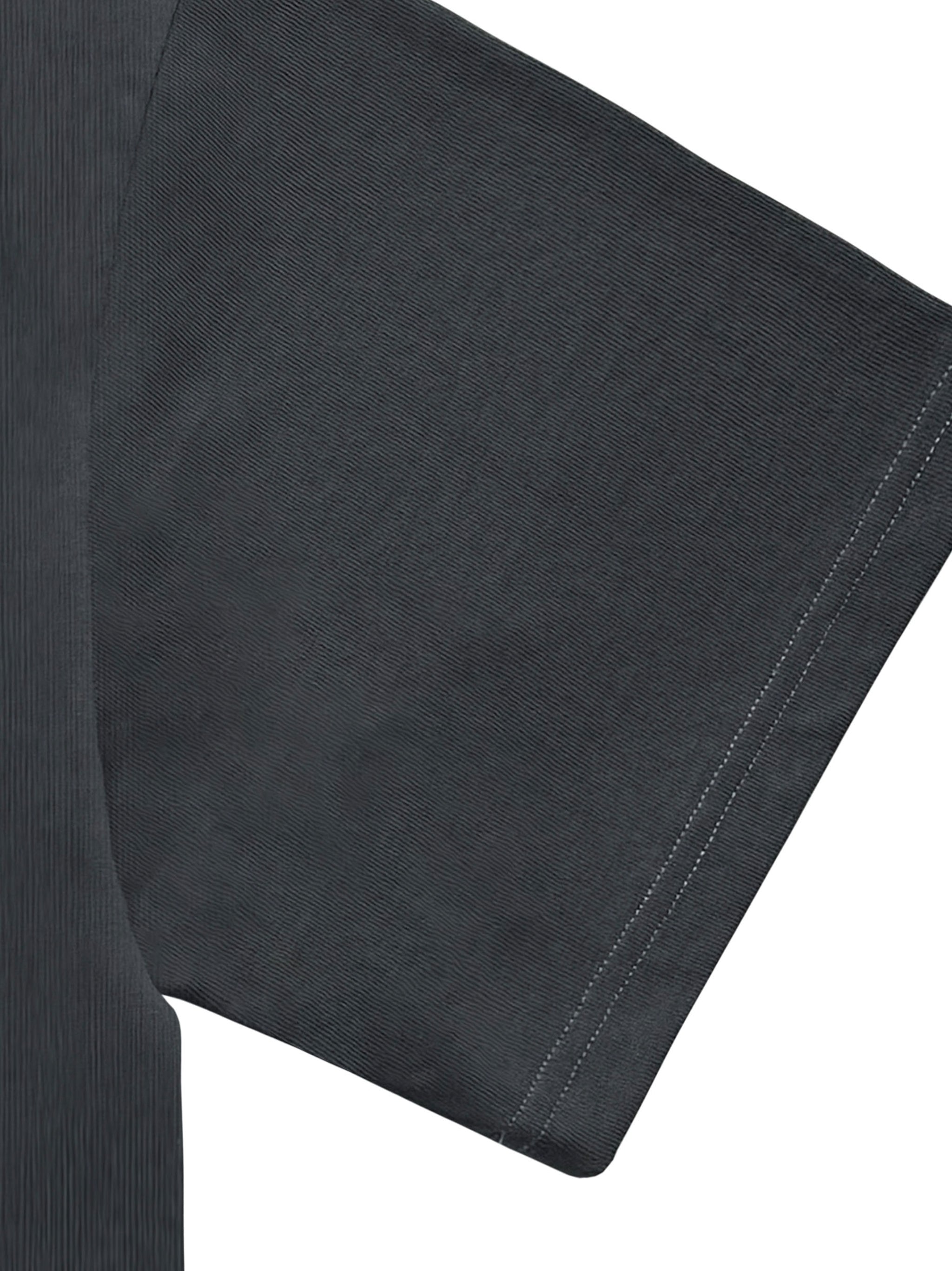 Close-up of black heavyweight knitted T-shirt sleeve with visible stitching detail