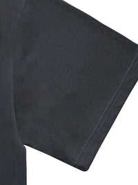 Close-up of black heavyweight knitted T-shirt sleeve with visible stitching detail