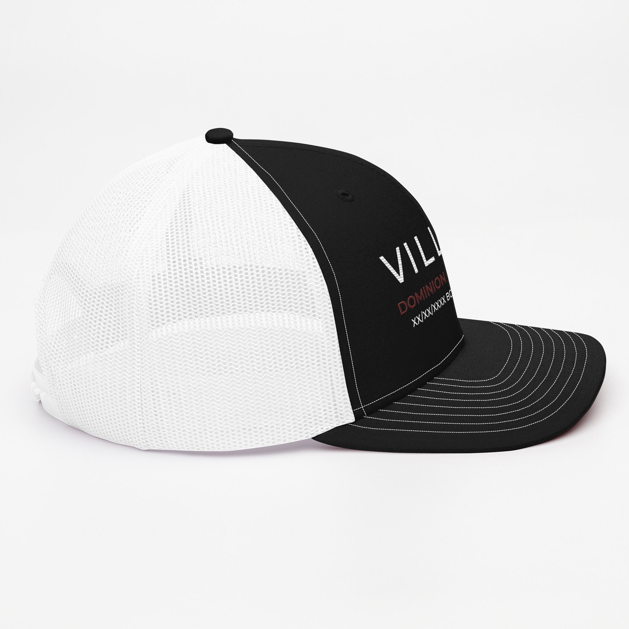 Black and white mesh trucker cap with 'VILLAIN DOMINION' embroidered on front panel