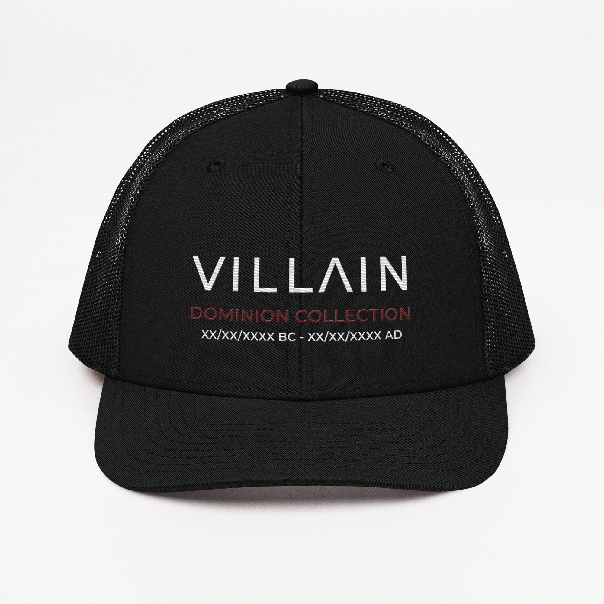 Black trucker cap with 'VILLAIN DOMINION COLLECTION' embroidered on the front in white and red.