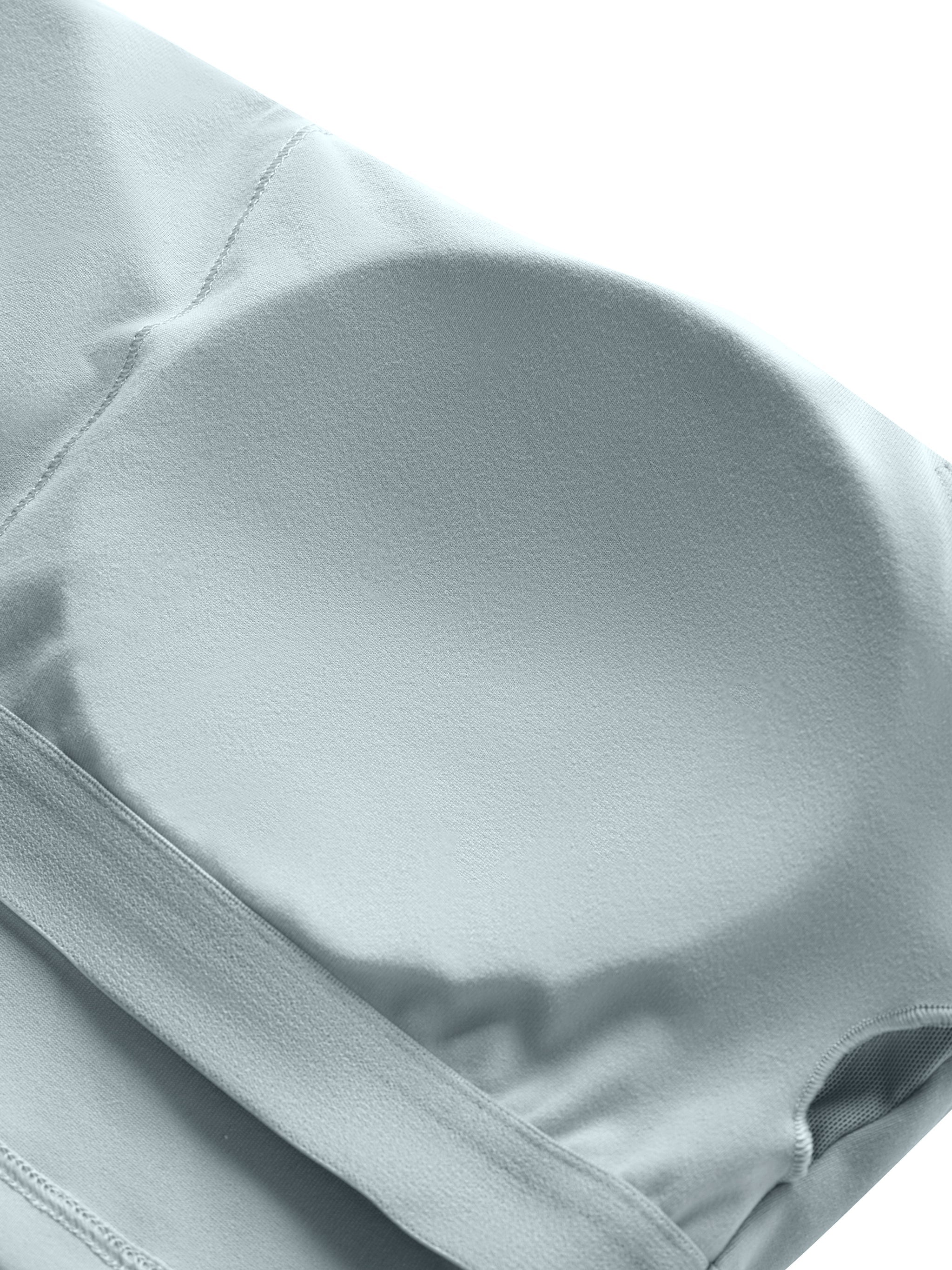 Close-up of light blue spaghetti strap yoga sports bra with soft padded fabric
