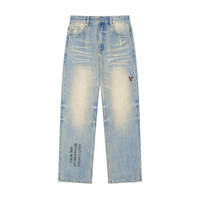 Light wash raw hem denim jeans with faded effect, wide leg, and streetwear text details.