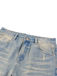 Light blue raw hem denim jeans with sun-fade wash and subtle distressed details