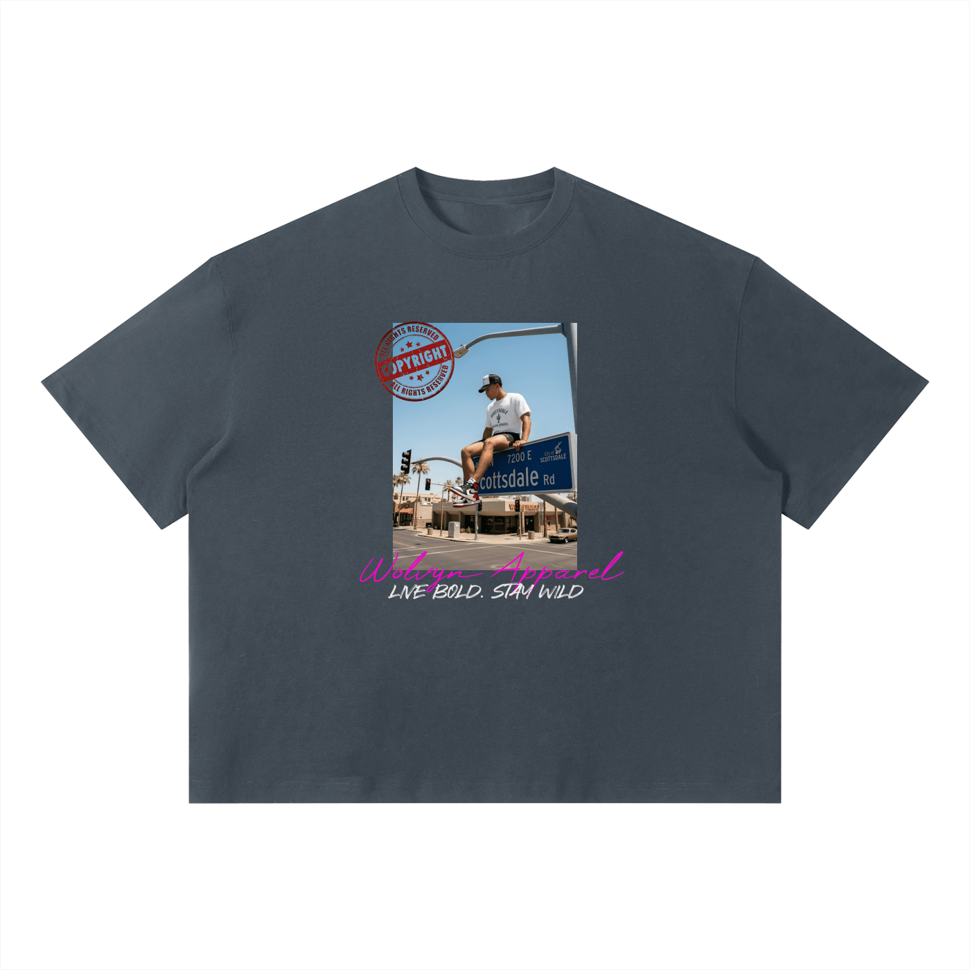Unisex boxy streetwear t-shirt with city graphic and bold text design on front.