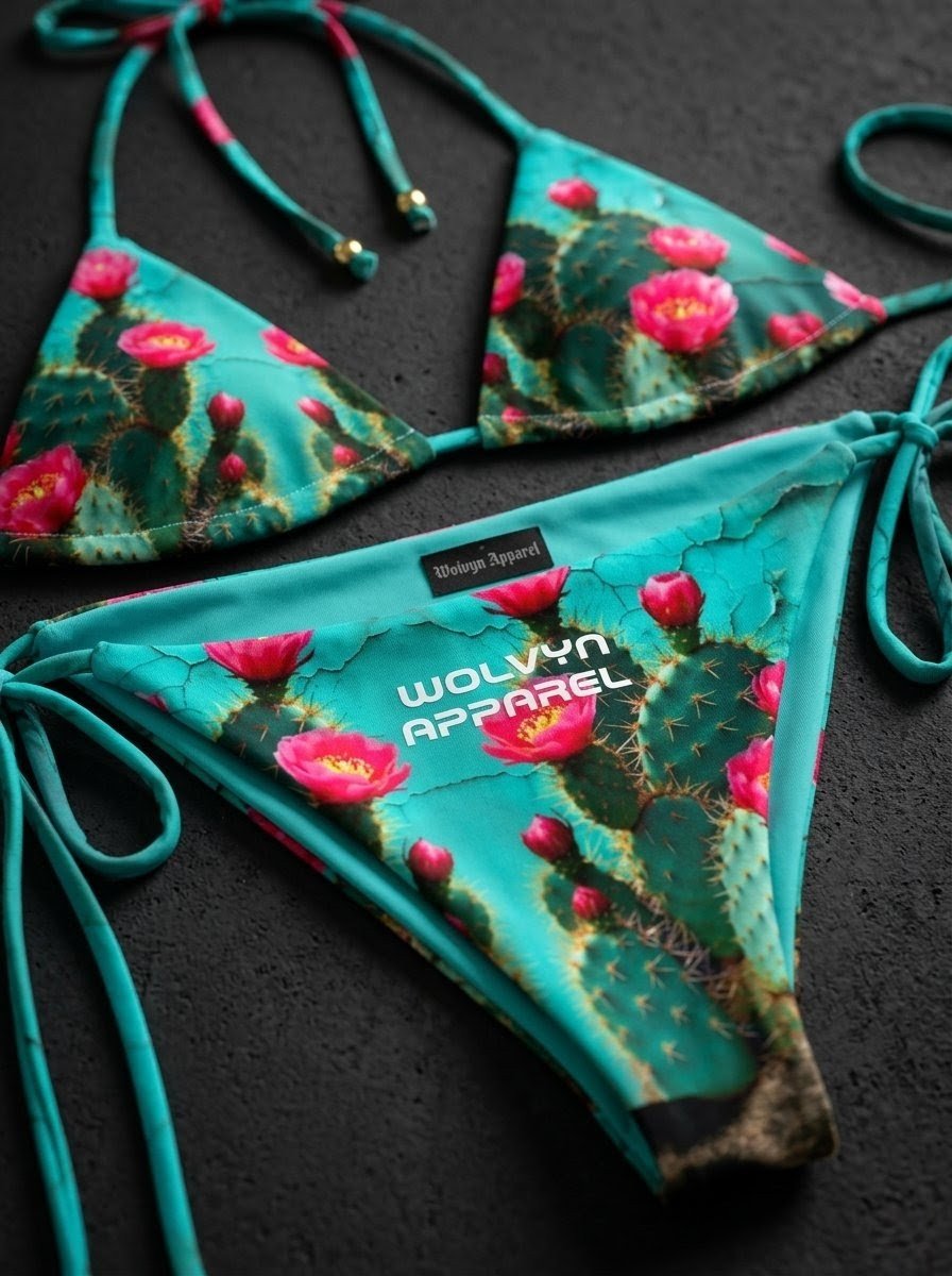 Turquoise string bikini with Arizona cactus and pink flower print on dark background