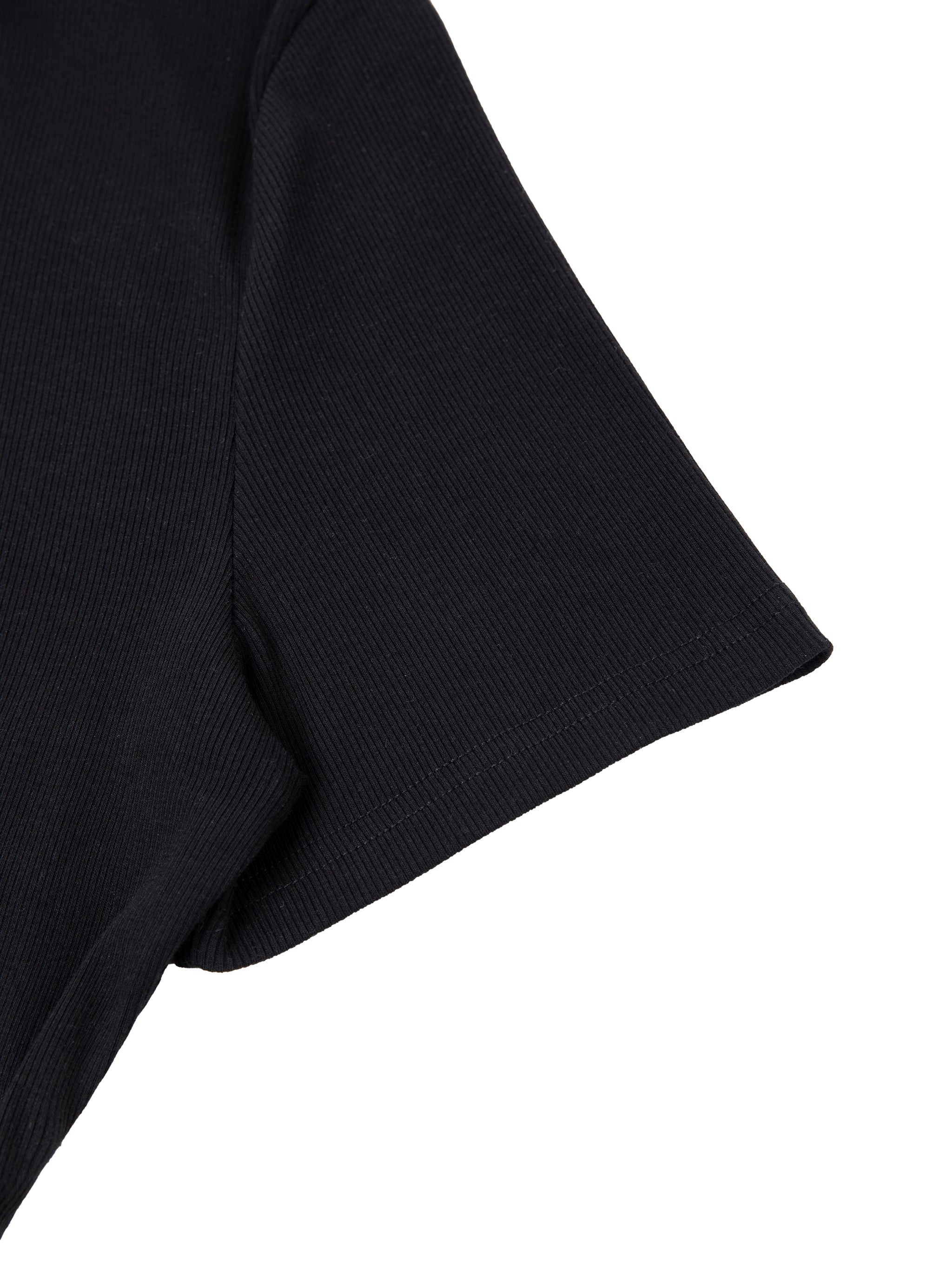 Close-up of black ribbed slim-fit women's t-shirt sleeve on white background