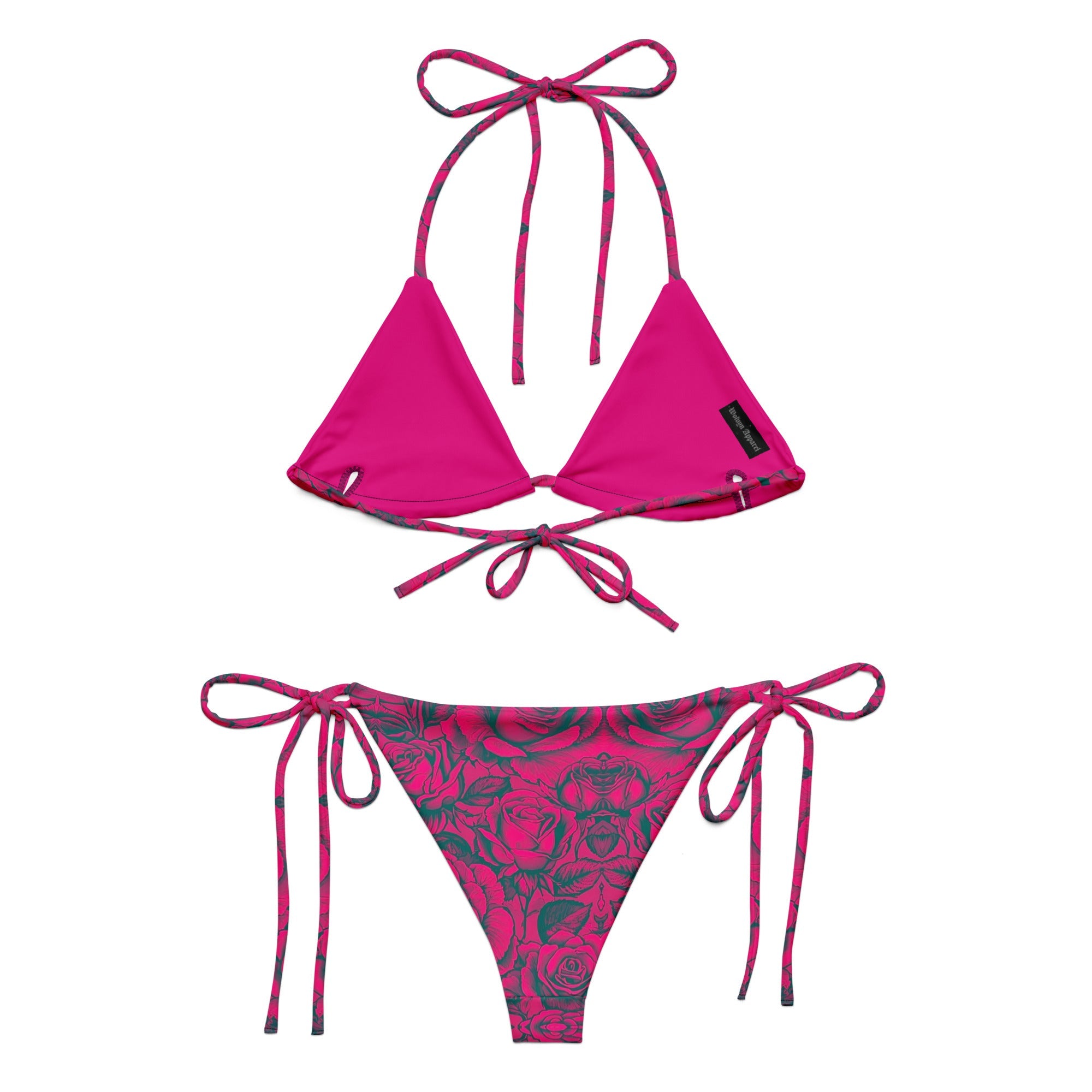 Hot pink string bikini with rose floral print bottoms and adjustable tie straps, flat lay.