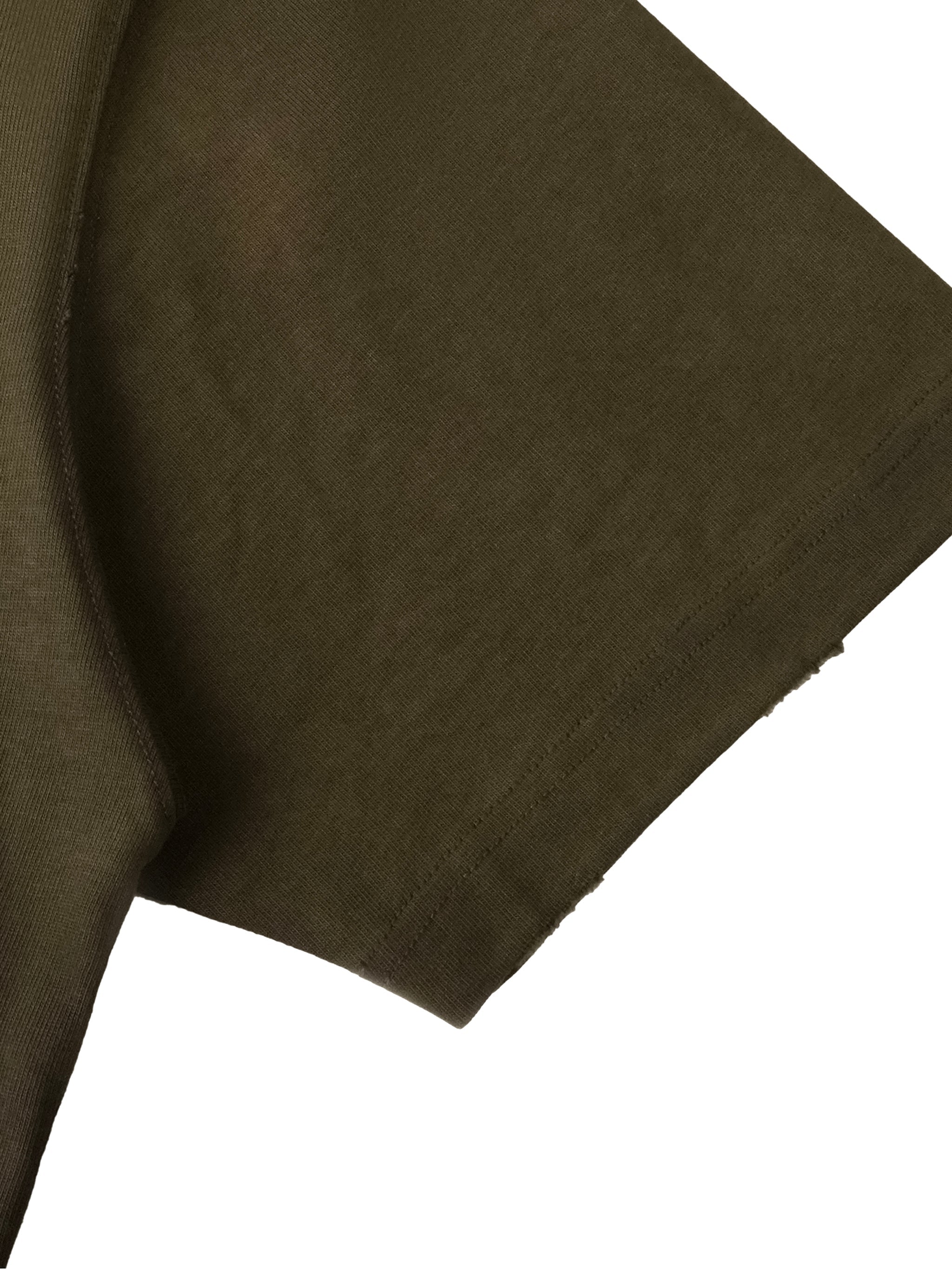 Close-up of olive green sun-fade distressed short sleeve boxy t-shirt fabric