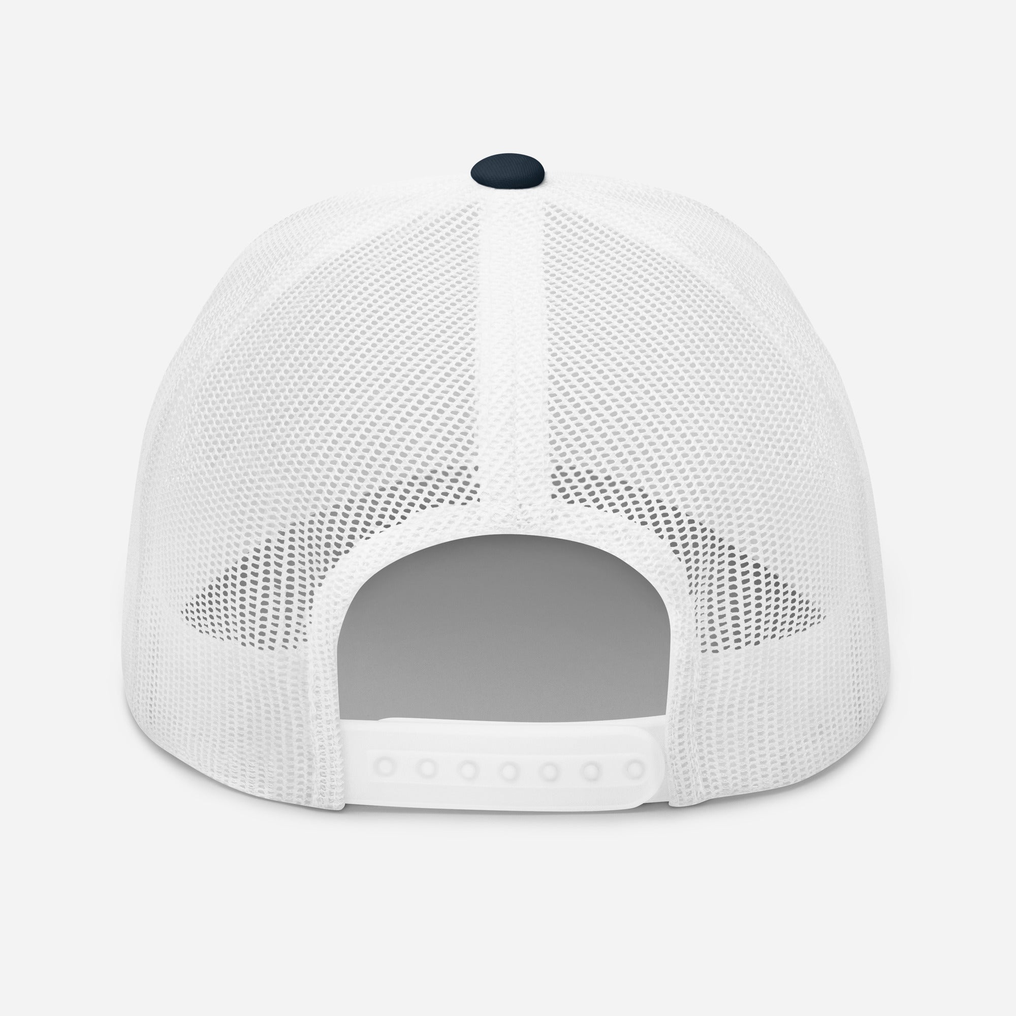 Back view of white mesh trucker cap with adjustable snap closure and mid-profile fit