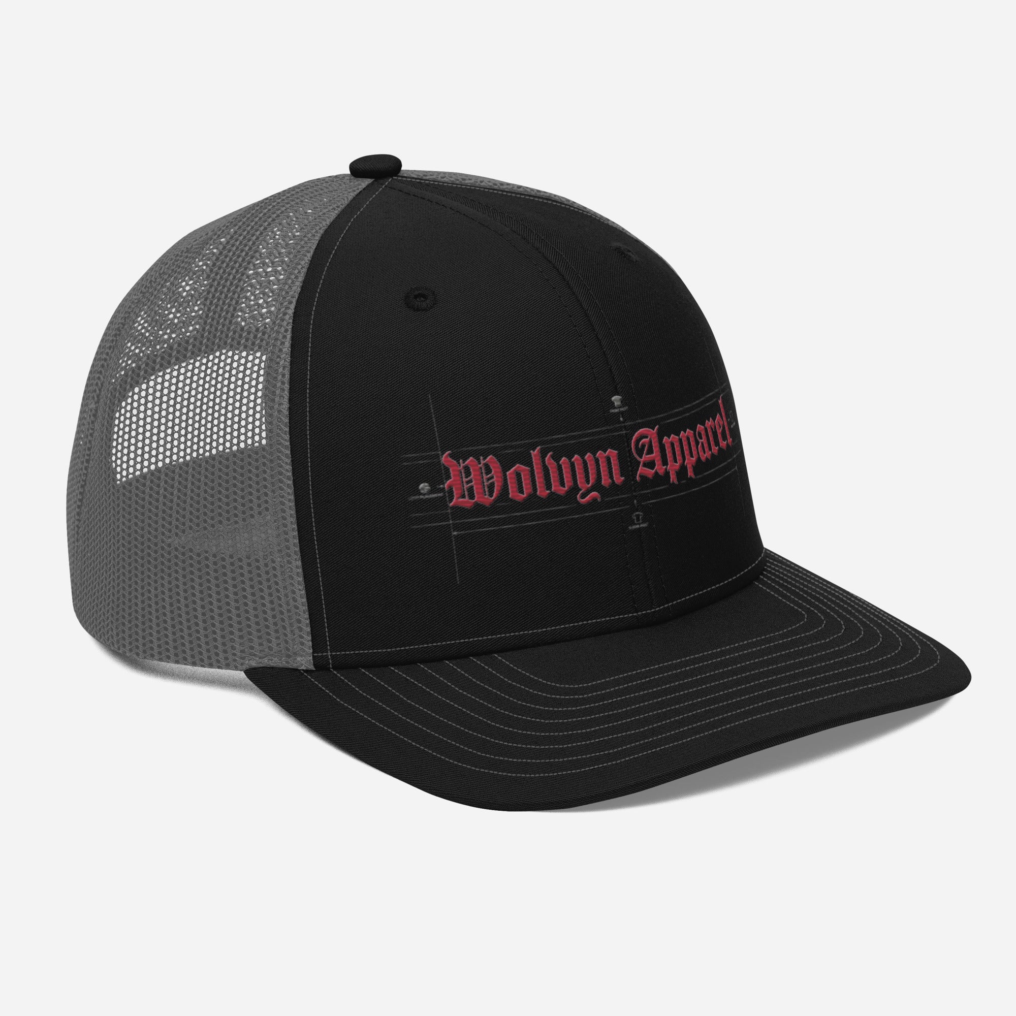 Black and gray mesh trucker cap with red embroidered 'Wolvyn Apparel' logo on front panel.