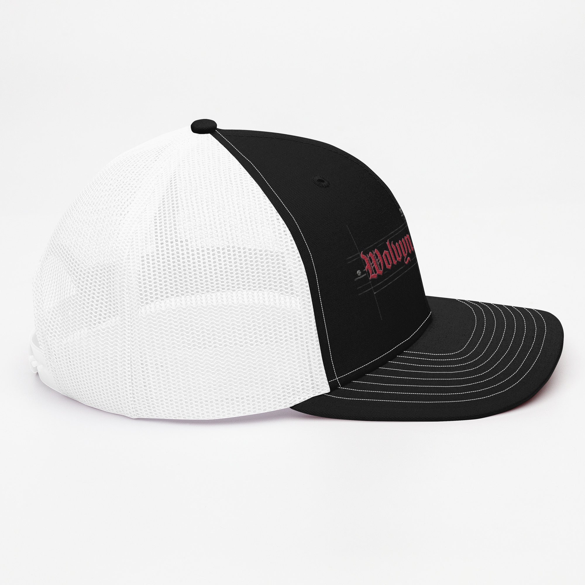 Black and white trucker cap with mesh back and red embroidered front text on white background