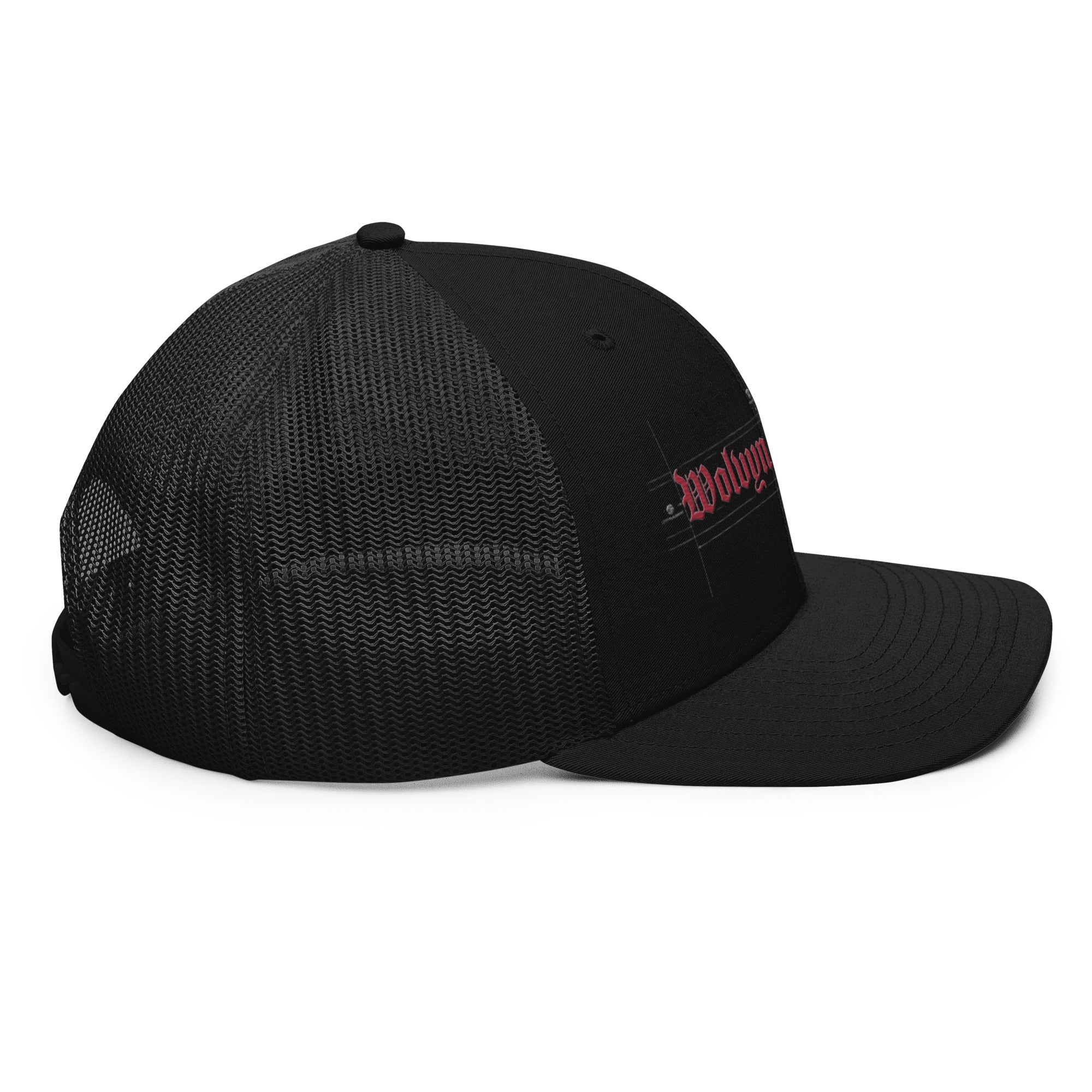 Black trucker cap with mesh back and red embroidered text on the front panel
