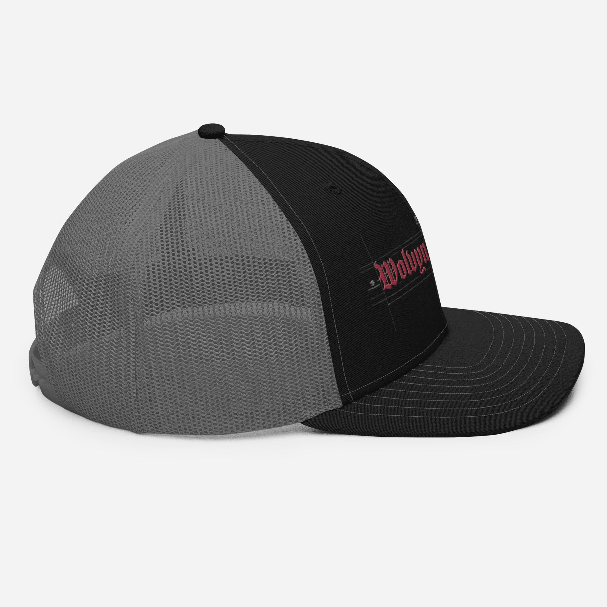 Black Richardson trucker cap with gray mesh and red embroidered text on front panel
