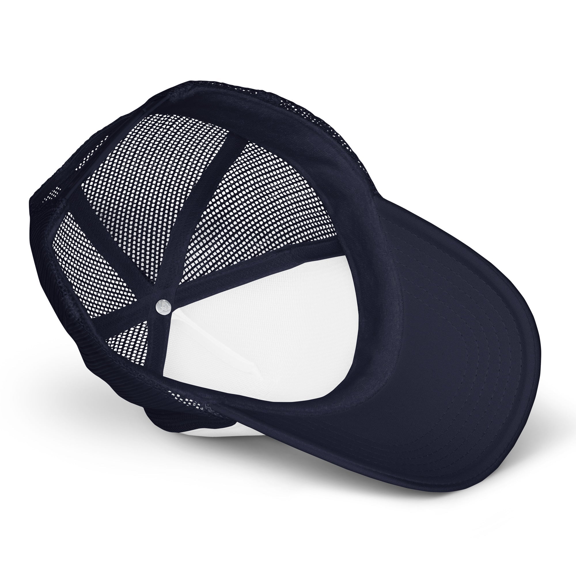 Black foam trucker hat with mesh back, viewed from the interior side.