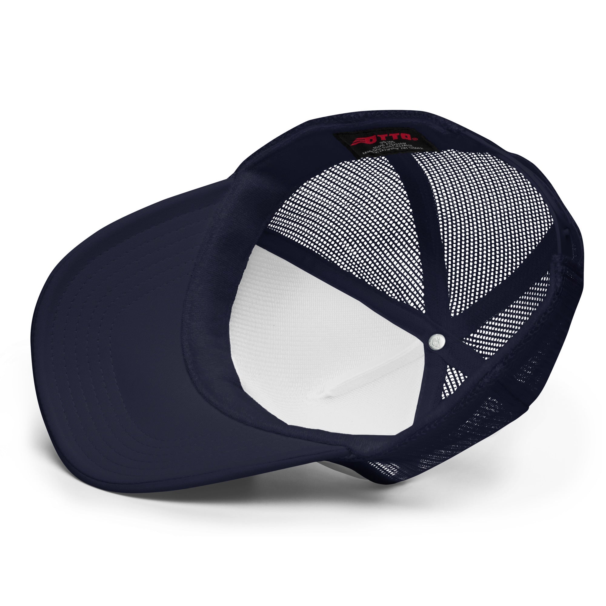 Interior view of a navy foam trucker hat showing mesh panels and stitched details