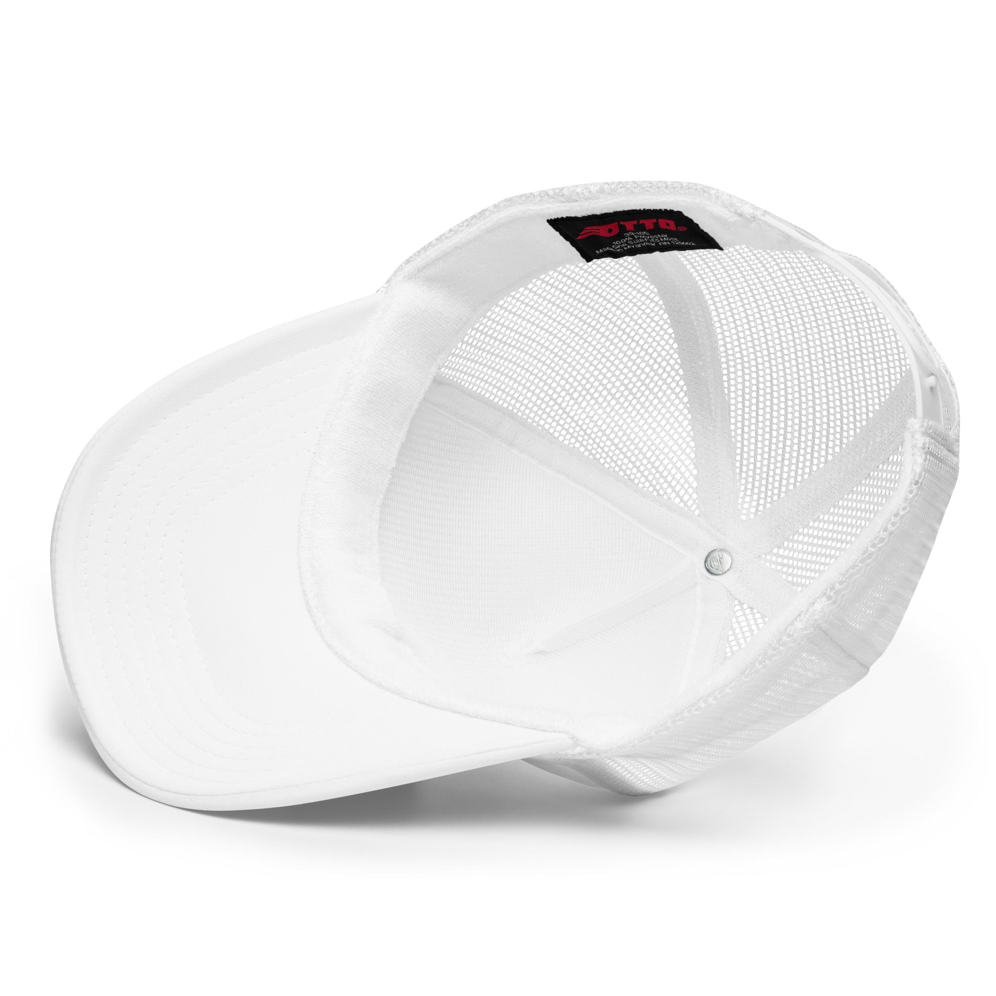 Inside view of a white foam mesh trucker hat with curved brim and inner label