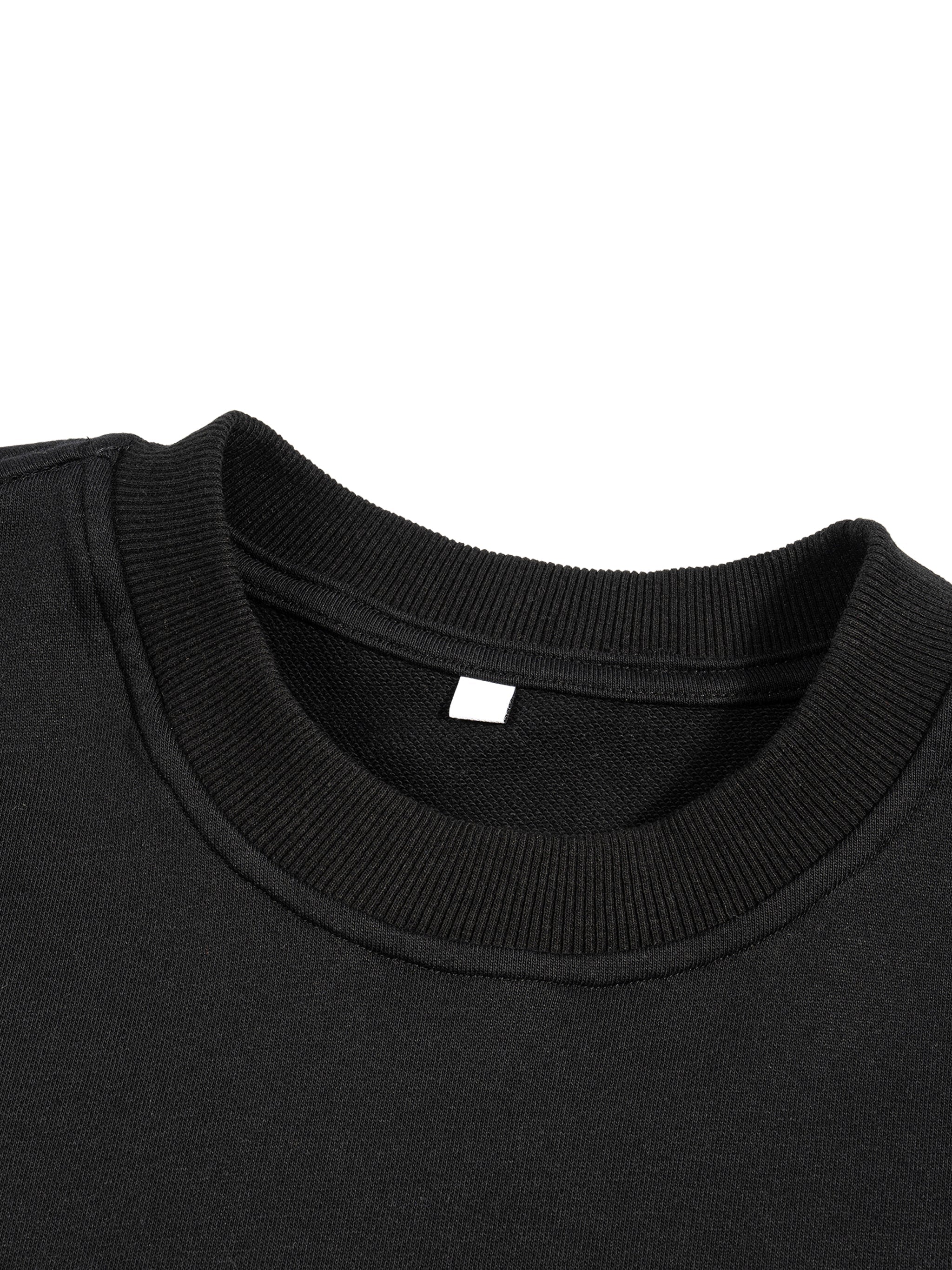 Close-up of black French terry tank top with ribbed crew neckline, heavyweight streetwear