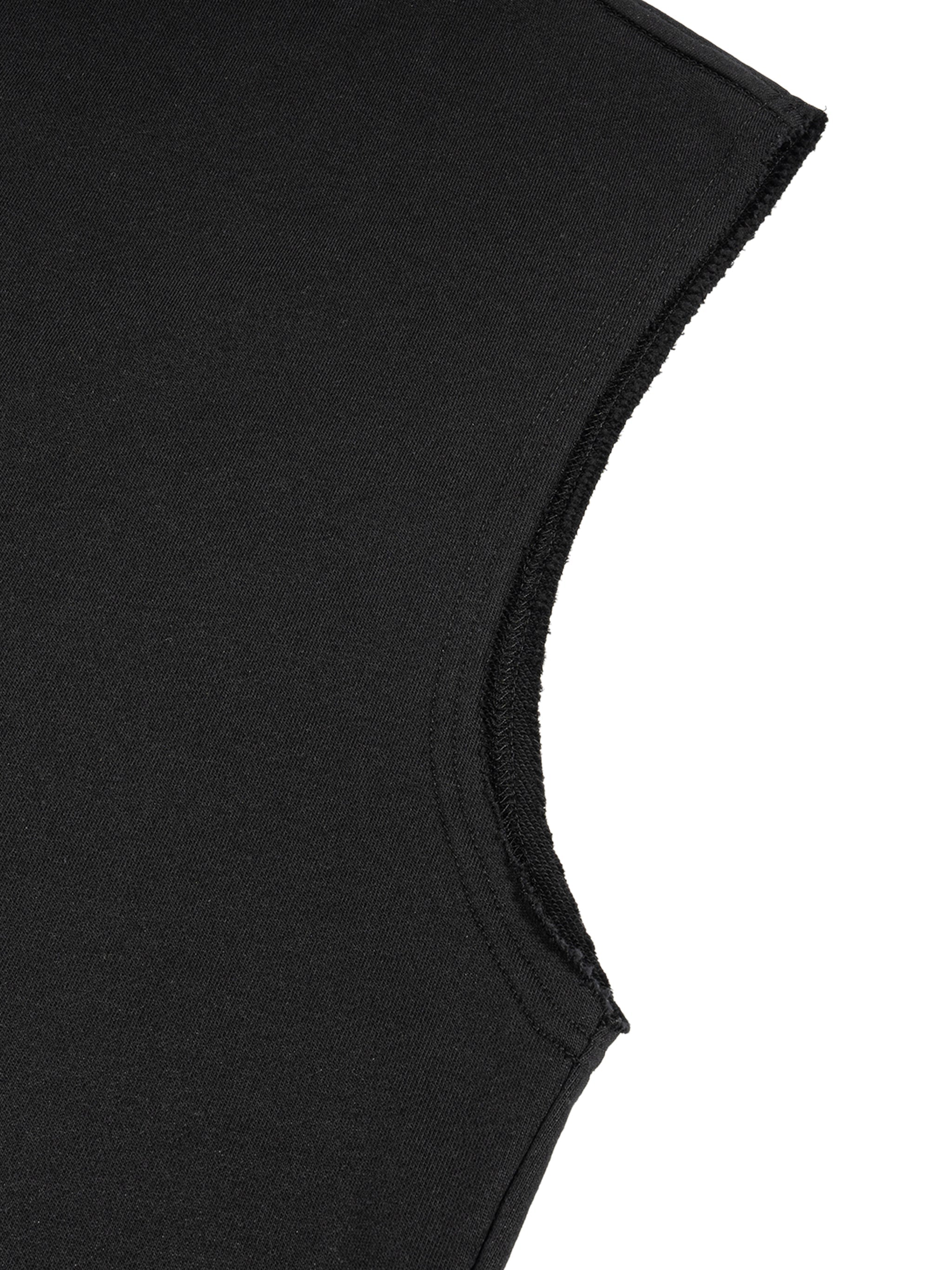 Close-up of black French terry boxy tank top armhole and fabric texture