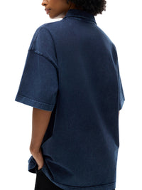 Heavyweight snow washed navy polo t-shirt with relaxed fit, shown from the back