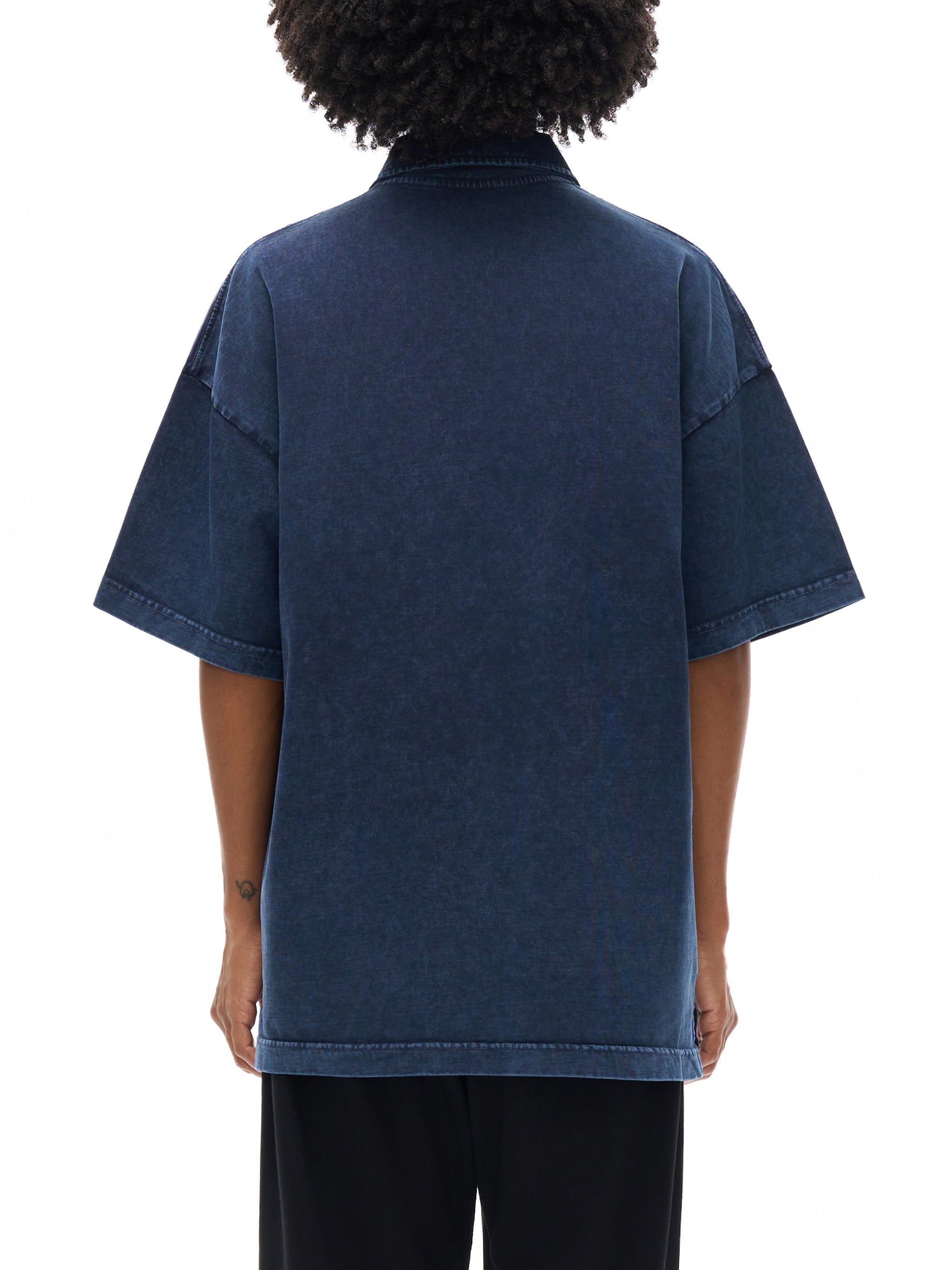 Back view of heavyweight snow washed navy blue polo t-shirt with short sleeves