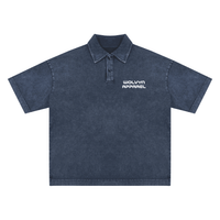 Heavyweight snow washed blue polo shirt with short sleeves and embroidered chest logo