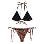Leopard print string bikini with black triangle top and pink script accents, front view