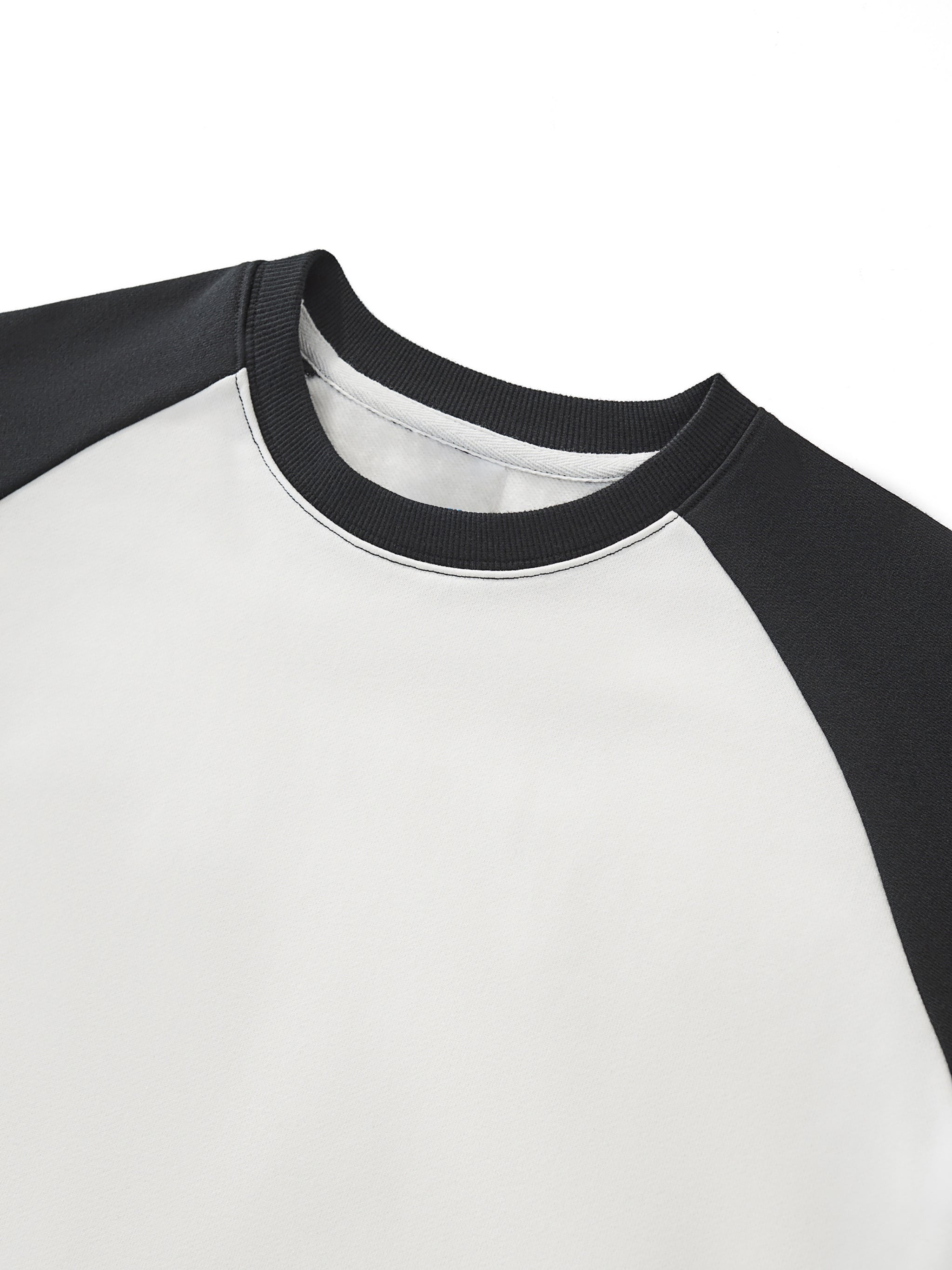 Black and white color block raglan crop sweatshirt with raw hem detail