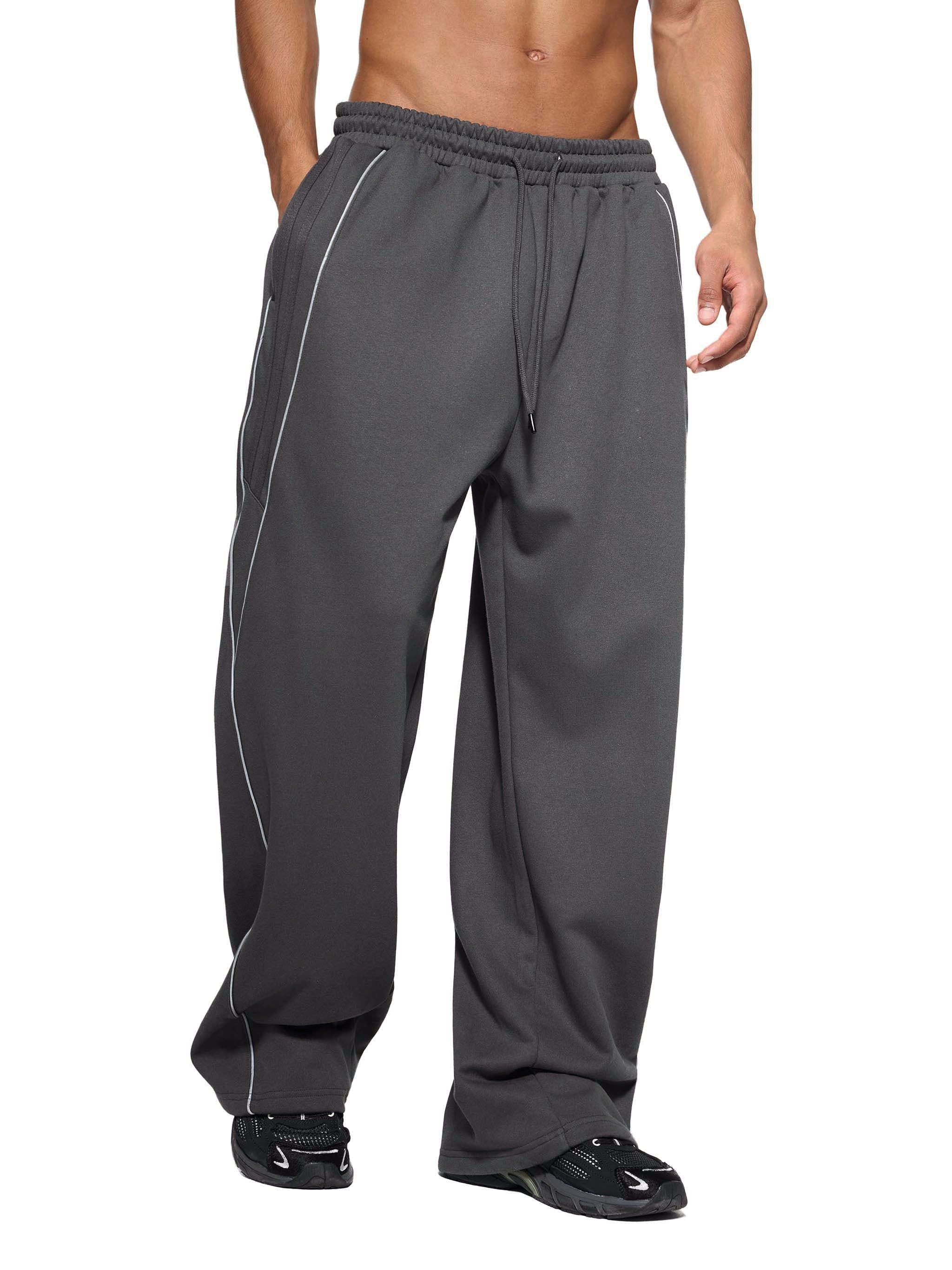 Dark gray straight-leg sweatpants with white stripes, elastic waistband, and drawstring