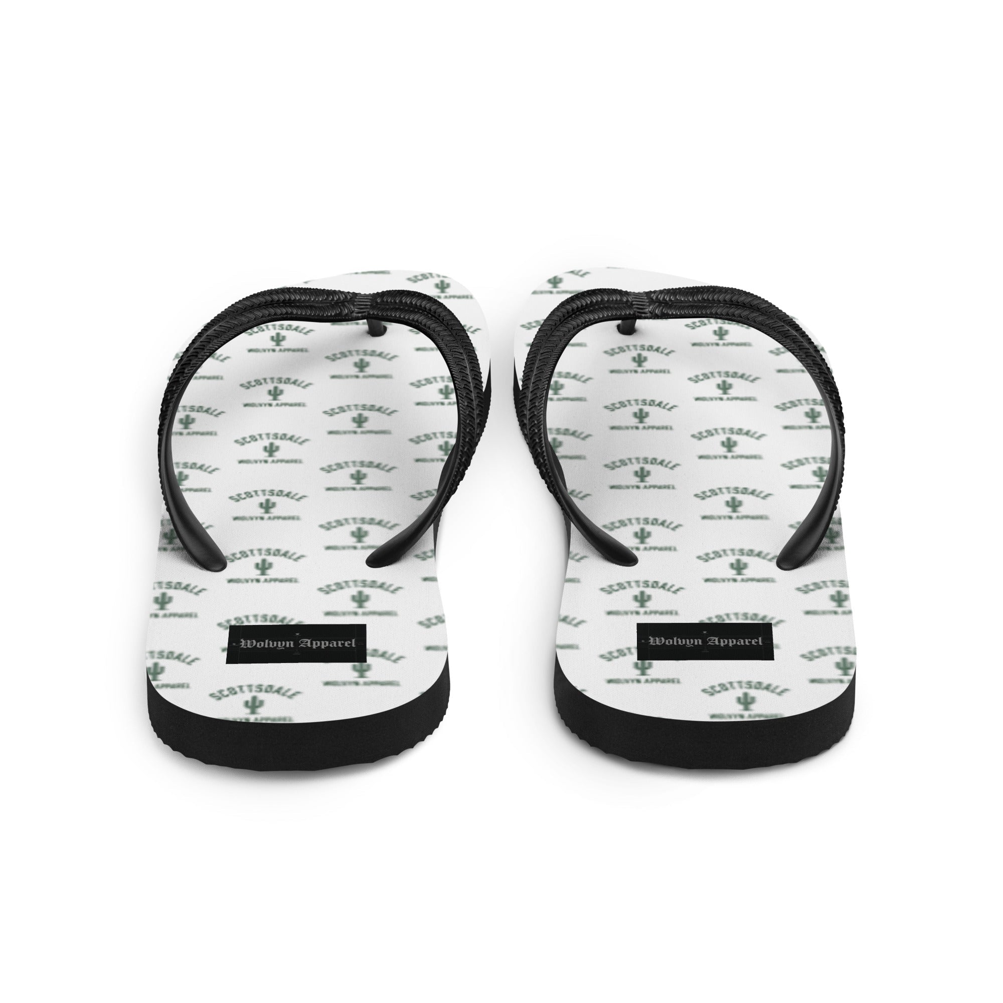 White flip flops with black straps, Scottsdale cactus print and text, on plain background