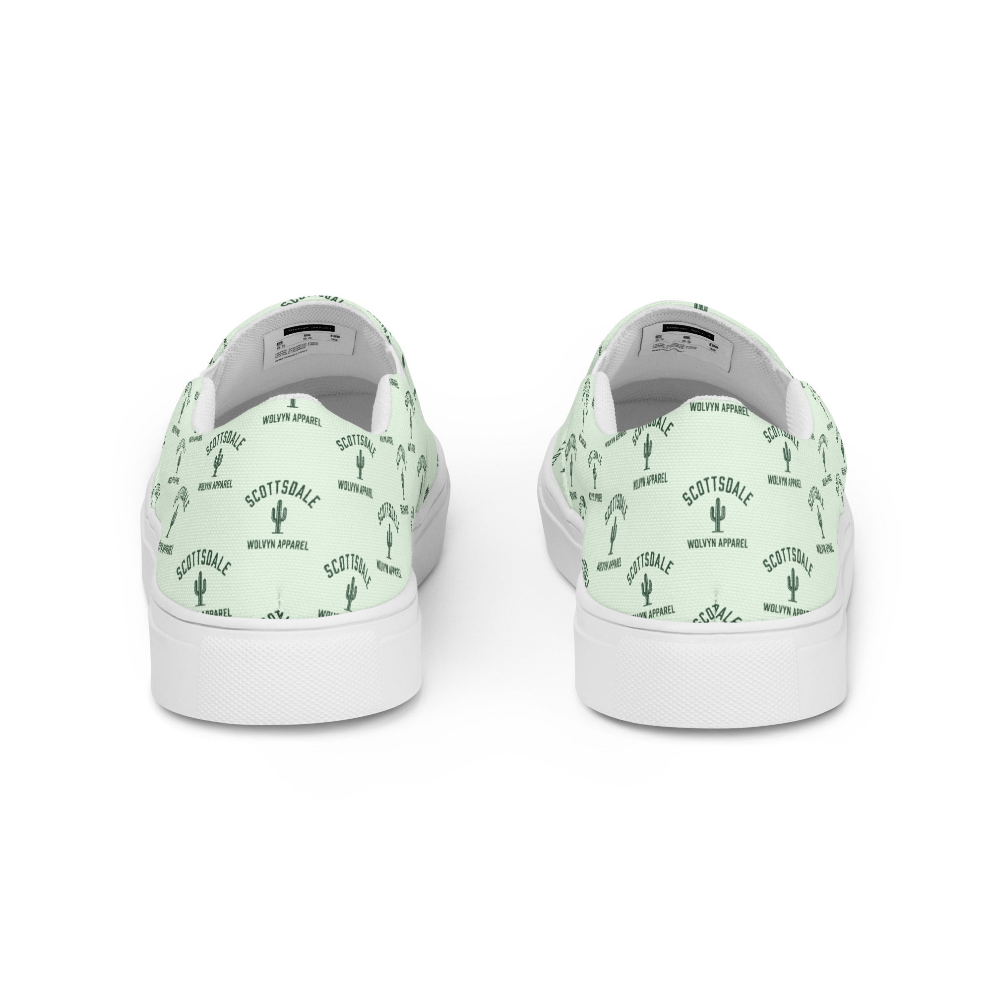 Back view of men's slip-on canvas shoes with cactus and Scottsdale print, white soles