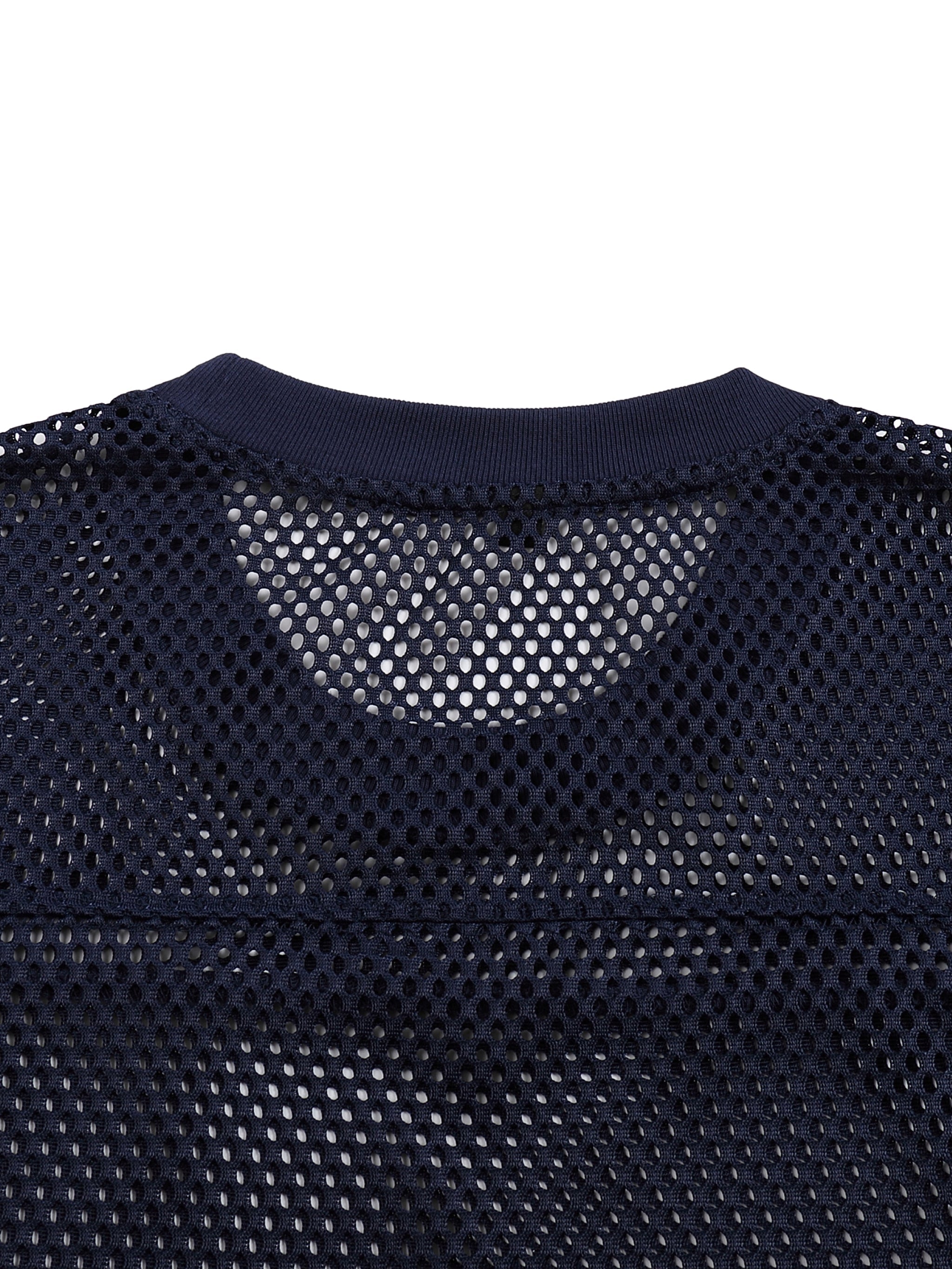 Close-up of black mesh see-through boxy net t-shirt with ribbed neckline