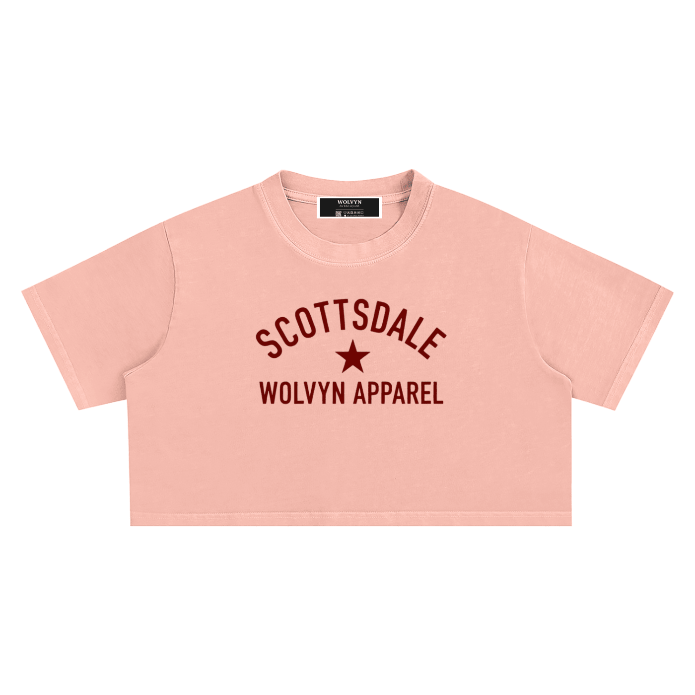 Pink snow-washed crop top with 'Scottsdale Wolvyn Apparel' text and star graphic.