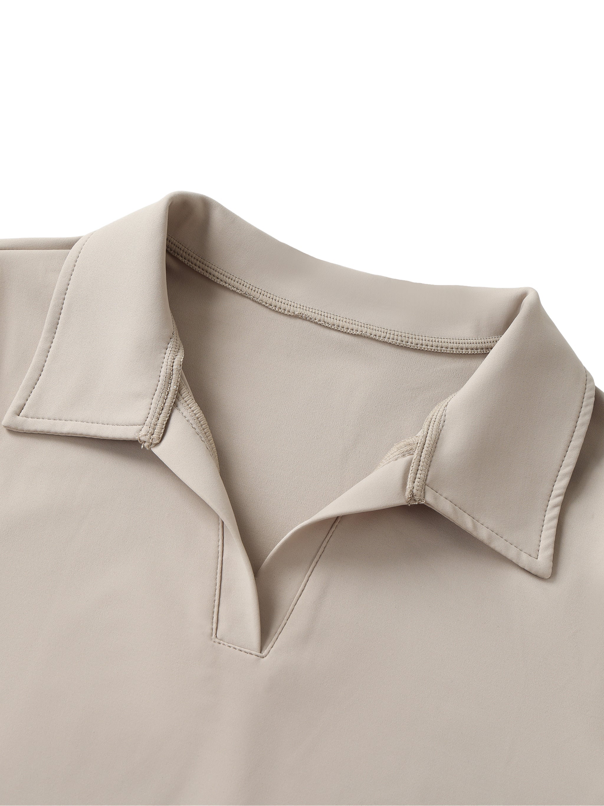 Beige V-neck lapel crop top with standout collar and soft heavyweight fabric close-up
