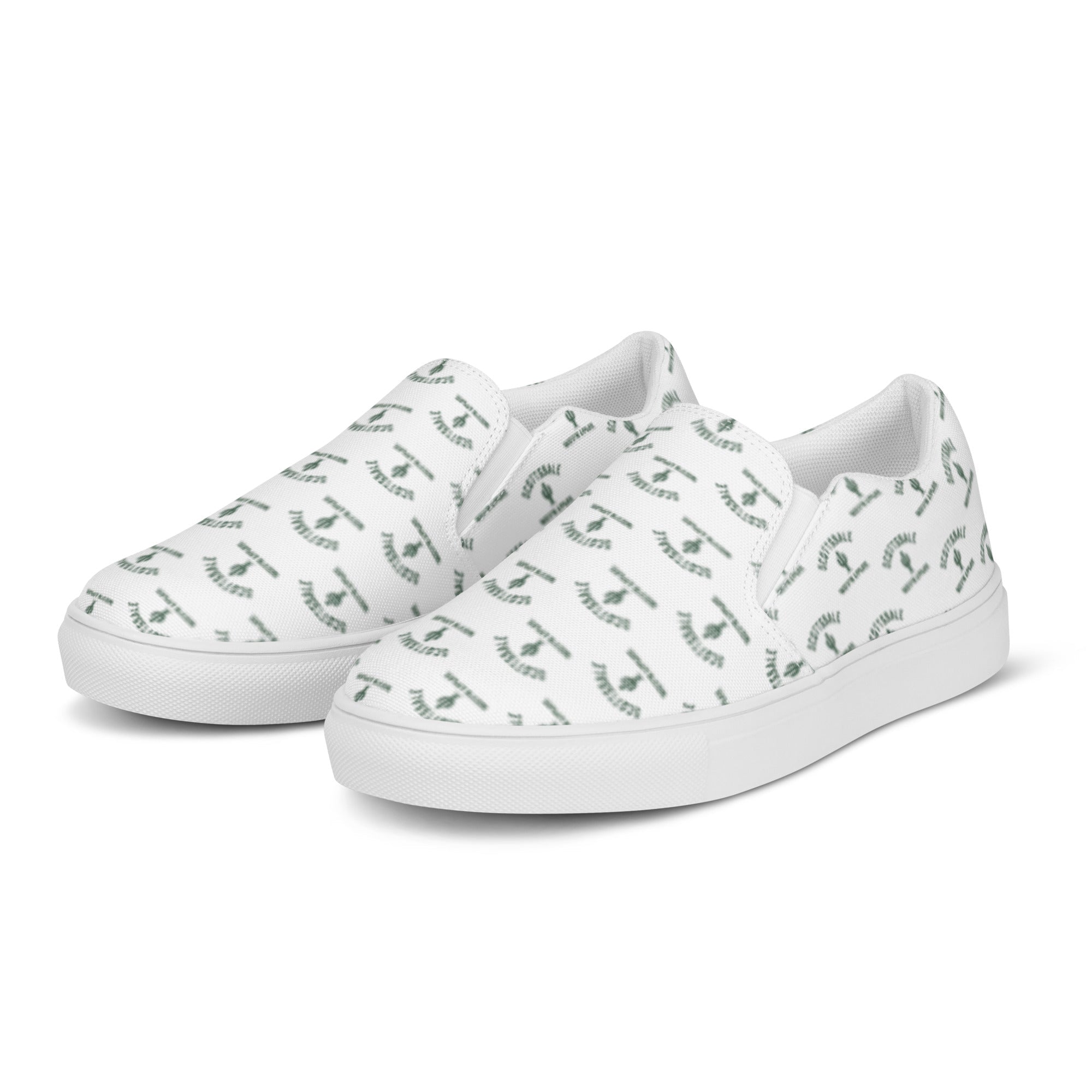 White women's slip-on canvas shoes with green abstract pattern, side view