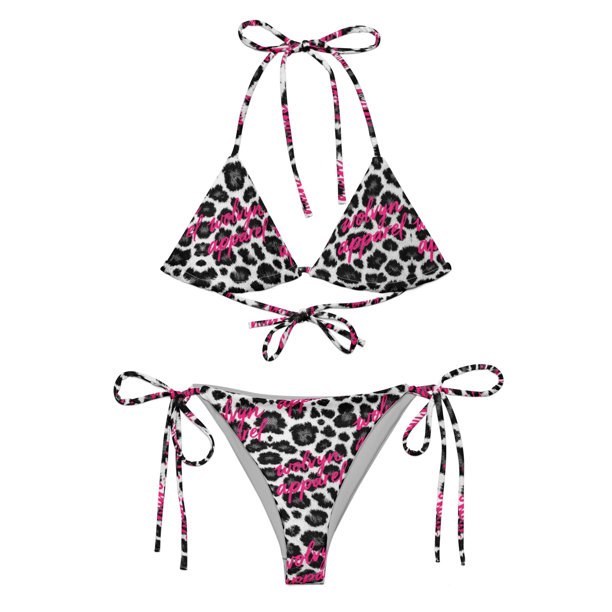 Snow leopard print string bikini with pink script accents on white background