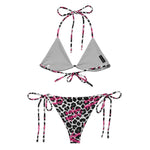 String bikini with gray top and snow leopard print bottom, pink script, tie straps