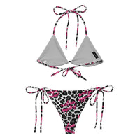 String bikini with gray top and snow leopard print bottom, pink script, tie straps