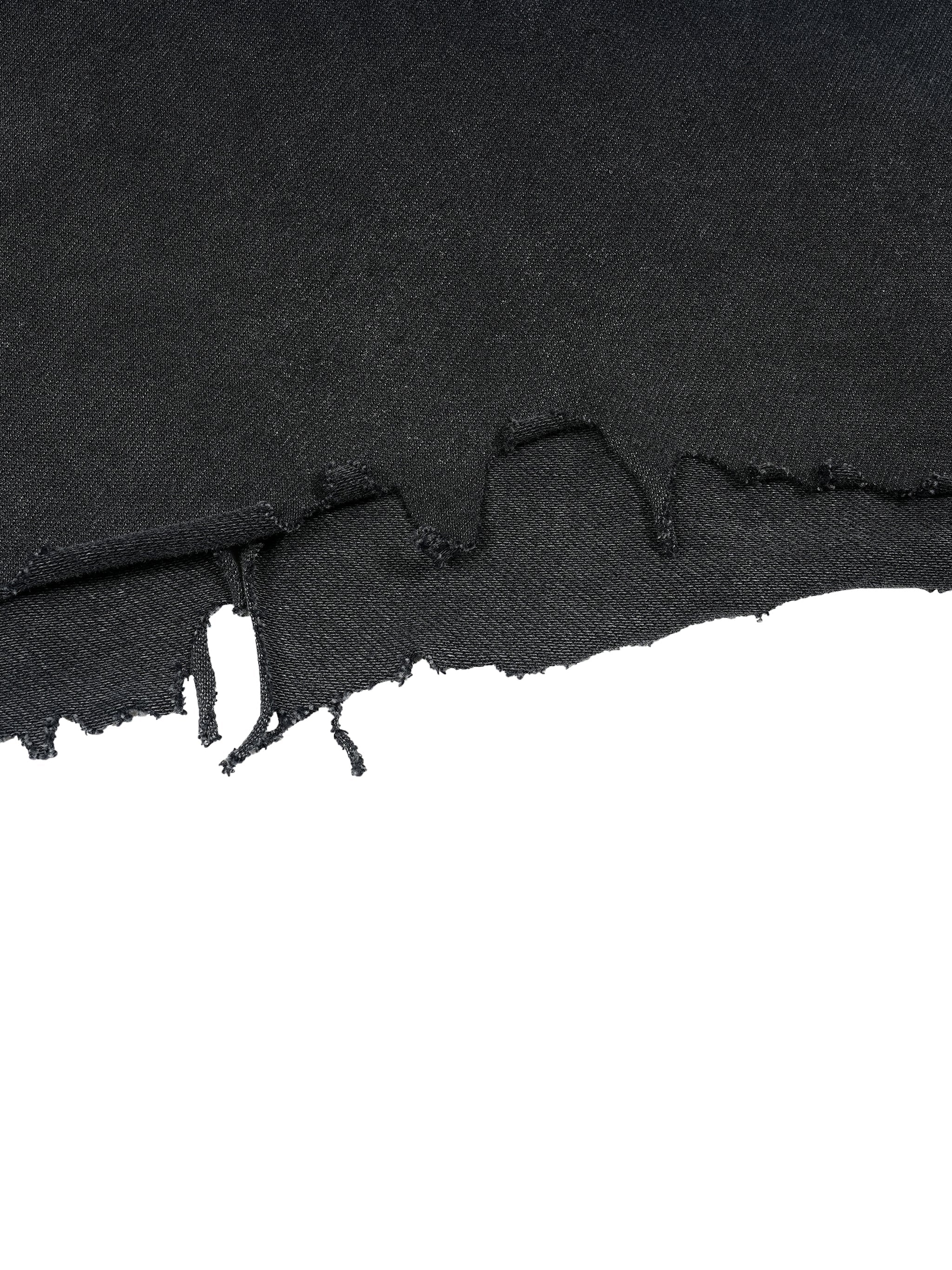 Black boxy t-shirt with vintage wash and raw distressed hem detail, streetwear style