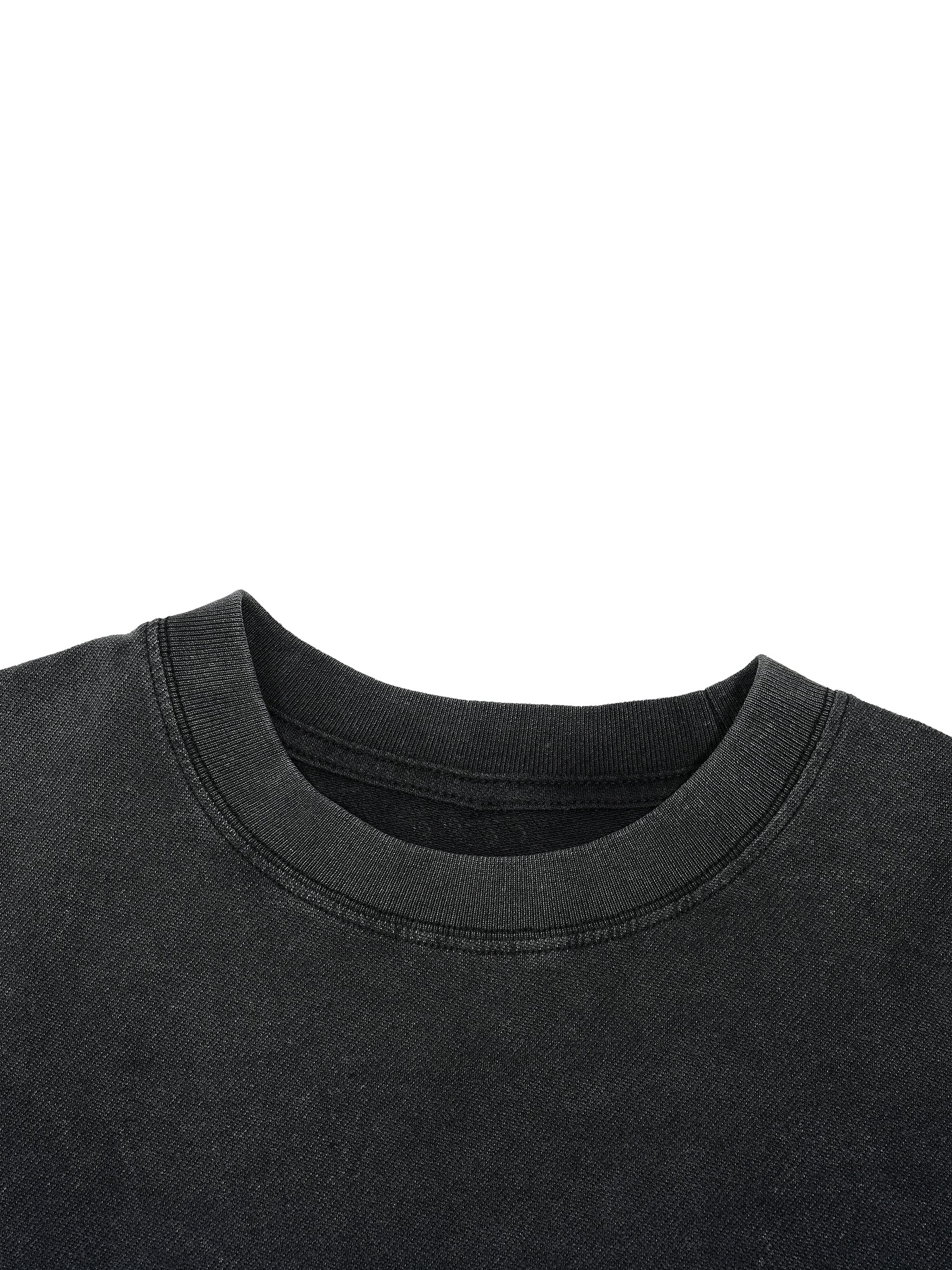 Black vintage wash boxy t-shirt with distressed hem and heavyweight streetwear style