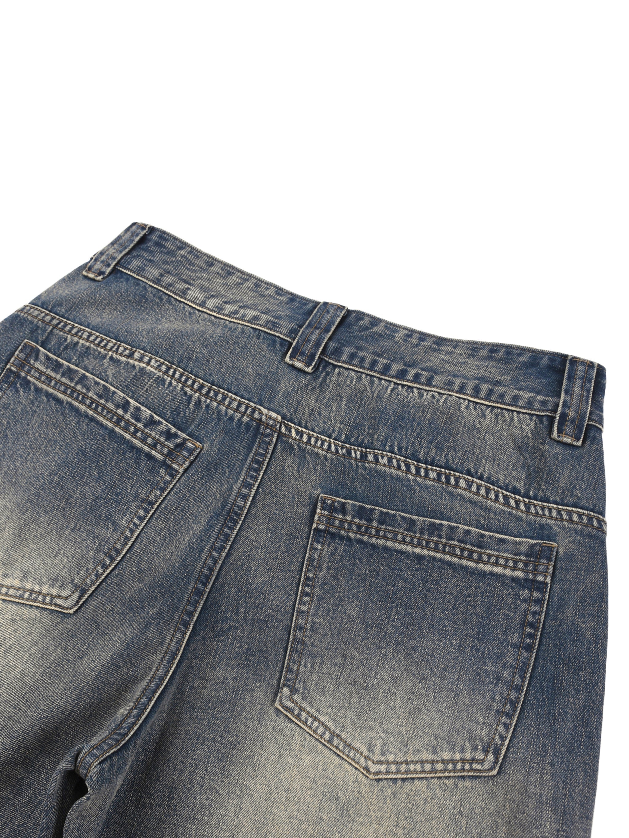 Back view of vintage wash baggy denim shorts with faded pockets and belt loops