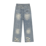 Vintage wash distressed denim jeans with back embroidery and ripped details