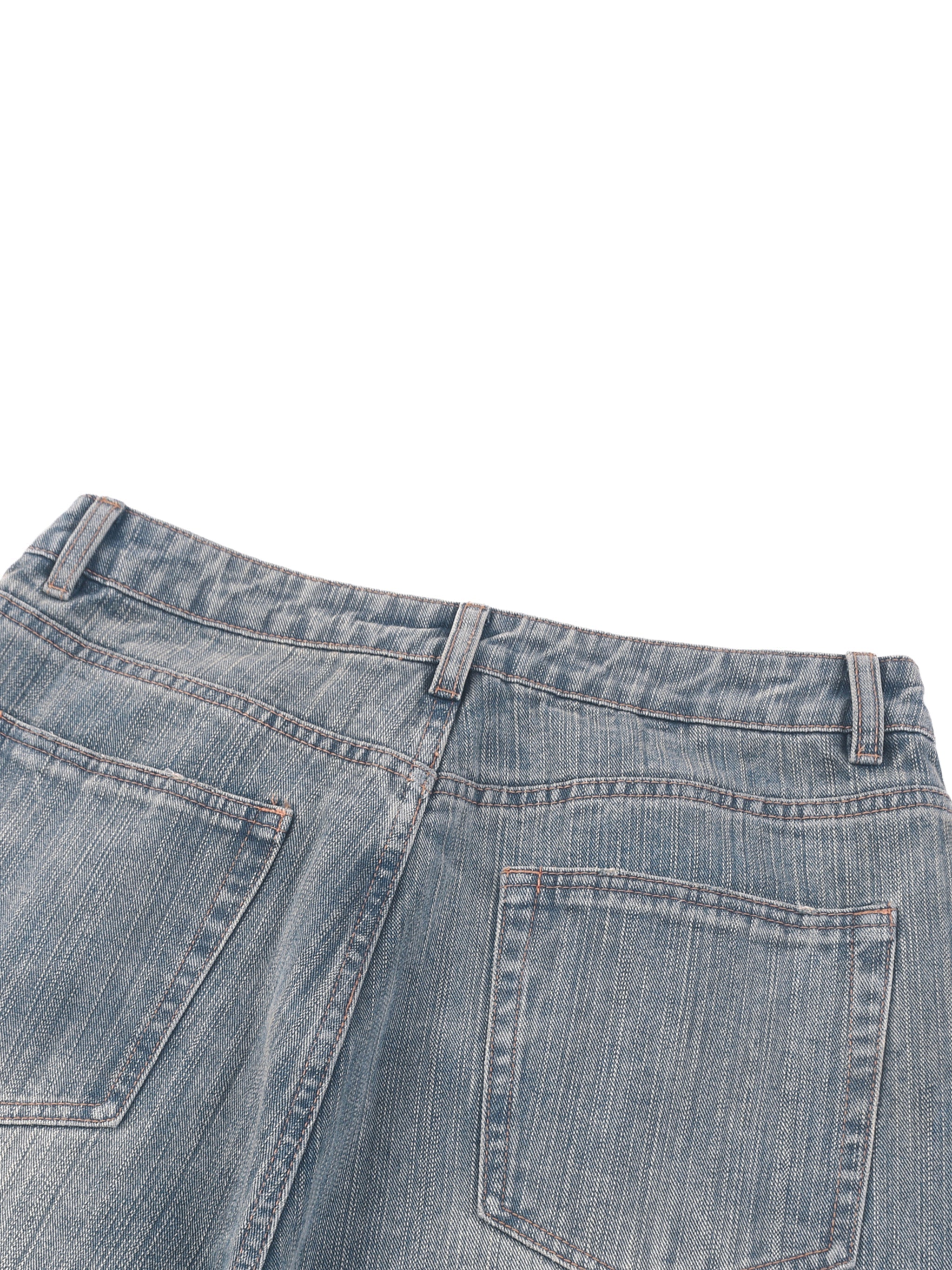 Back view of vintage wash distressed denim jeans with rear pockets and belt loops